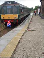 The train now standing at ...