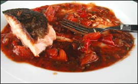 Crispy Salmon with tomato and sweet pepper sauce.