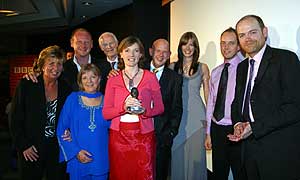 Staff from Station of the Year Radio Solent - including Editor Mia Costello (centre in red) - with BBC Director-General Mark Thompson (far right)