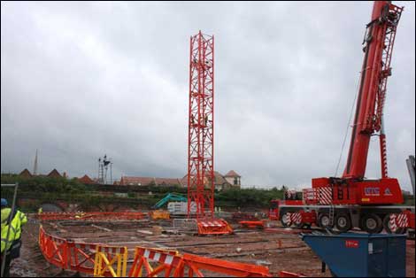 Base of a crane is erected at the site for the new campus of the University of Worcester.