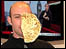 Stewart tossing a pancake