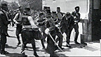 Llofruddiaeth Archduke Franz Ferdinand o Awstria yn Serbia a ddechreuodd y rhyfel.