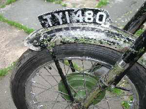 The green army paint can still be seen under the black of the Garda livery.