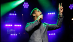 Robbie Williams performs at BBC Electric Proms 2009