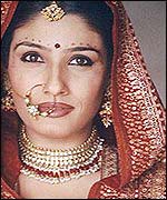 Raveena Tandon as Reena