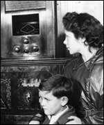 family listening to radio