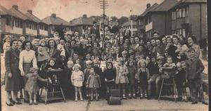 The Residents of Highfield Road, Collier Row, Romford in Essex Celebrating VJ Day in August 1945 with a Street Party