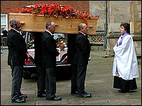John's coffin being received at the cathedral
