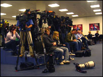 The cameras and journalists gathered inside the HSH Nordbank Arena in Hamburg for the Manchester City press conference