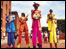 Beatles tribute act on stilts at the Mersey River