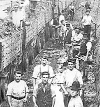 Workers unloading trains at the Silent Valley works