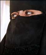 A muslim woman wearing a veil