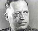 Photograph showing Colonel 'Tin Eye' Stephens chief interrogator at Camp 020
