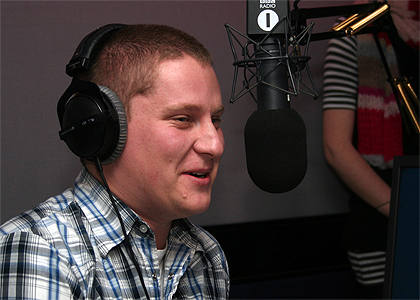 Russ enjoys our standard issue Radio 1 headphones. Hmmm fuzzy.
