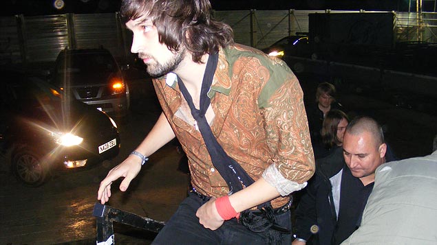 Serge from Kasabian leads the way up the stage entrance to the main arena...