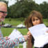 Alex and Chris try to deliver the breaking news before the wind takes it!