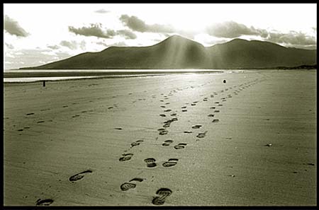 Footsteps in the sand at Dundrum Bay