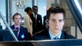 A Torchwood employee is coaxed away from their desk.