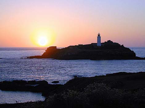 Sunset over Godrivey beach