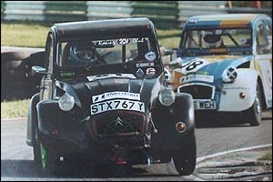 Christine driving her 2CV  in a race