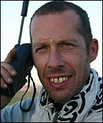 Picture: Peter Ash on the satellite phone