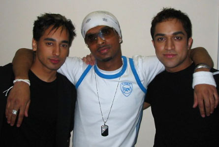 The three finalists share a moment after their performances 