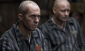 (l-r) Steven Dillane as Schmidt, Stellan Skarsgard as Baumgarten