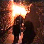 Walking down the steps.
