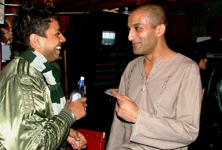 Juggy D and Adil share a joke backstage before the performance 