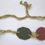 Marsh's ID tags -  with the original string on