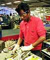 Worker at an electronics plant