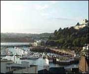 Torquay marina and overlooking hills