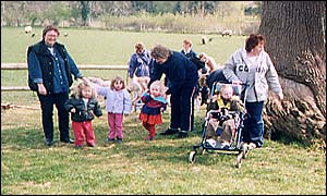 Children and adults in grounds.