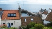 Exterior View and Harbourside Beyond.