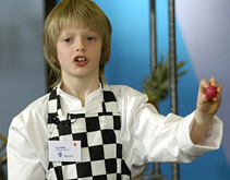 A contestant shows off his cooking skills at the Can You Cook It? Auditions