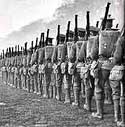 Image of soldiers marching with rifles in World War One