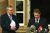Image of Tony Blair and Bertie Ahern addressing a press conference at Hillsborough Castle