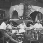 Piri, Freda Stanleigh, Mrs. X, Basil Stanleigh,     Mr. X -- drinks in our garden after a game of badminton. It is in fact Basil's lagonda in right background, but it looks just like Piri's! [K.L. 1940]