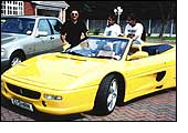 Shander, his ferrari and his girls