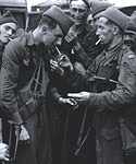 US Ranger and four Commmandos light up after the raid