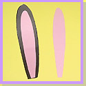 Image of pink ear shapes being glued to ears
