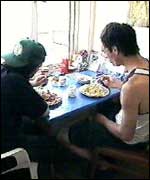 Satiana and Jason eating tea