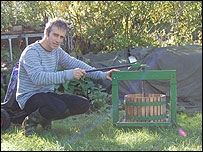 David Squirrel using a fruit press to make apple juice 