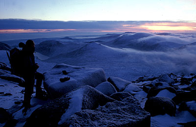 Standing on a frozen summit tor on Slieve Bearnagh