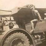 Thrashing the corn at Foxhall Farm in 1943.  Kathleen O'Dell (left) and Vera Rookyard (right)