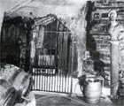 the rusting iron gate