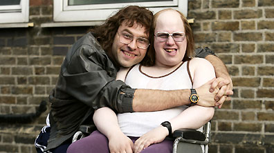 Lou and Andy hug