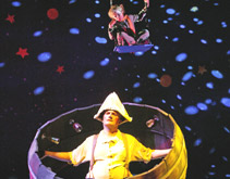 Joseph (The Little Prince) flys in the sky above Aled Jones (The Drunkard)