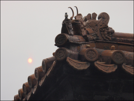 The sun battles to shine through in Beijing