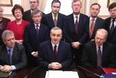 Image of Taoiseach Bertie Ahern surrounded by his cabinet after amending Articles 2 & 3 of the Irish Constitution, 2nd December 1999